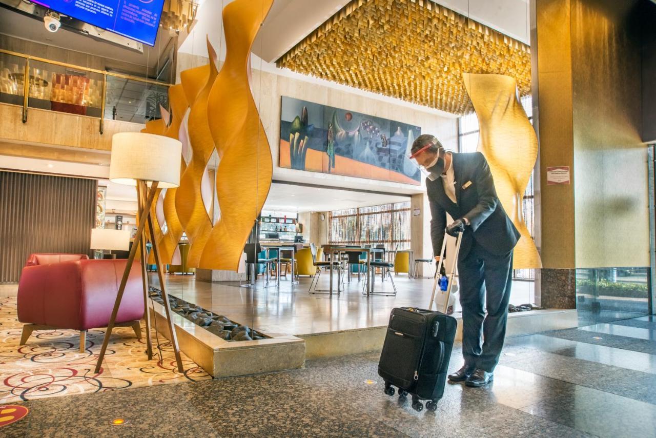 Bogota Plaza Hotel Exterior photo Concierge at the Conrad Hilton London St. Pancras