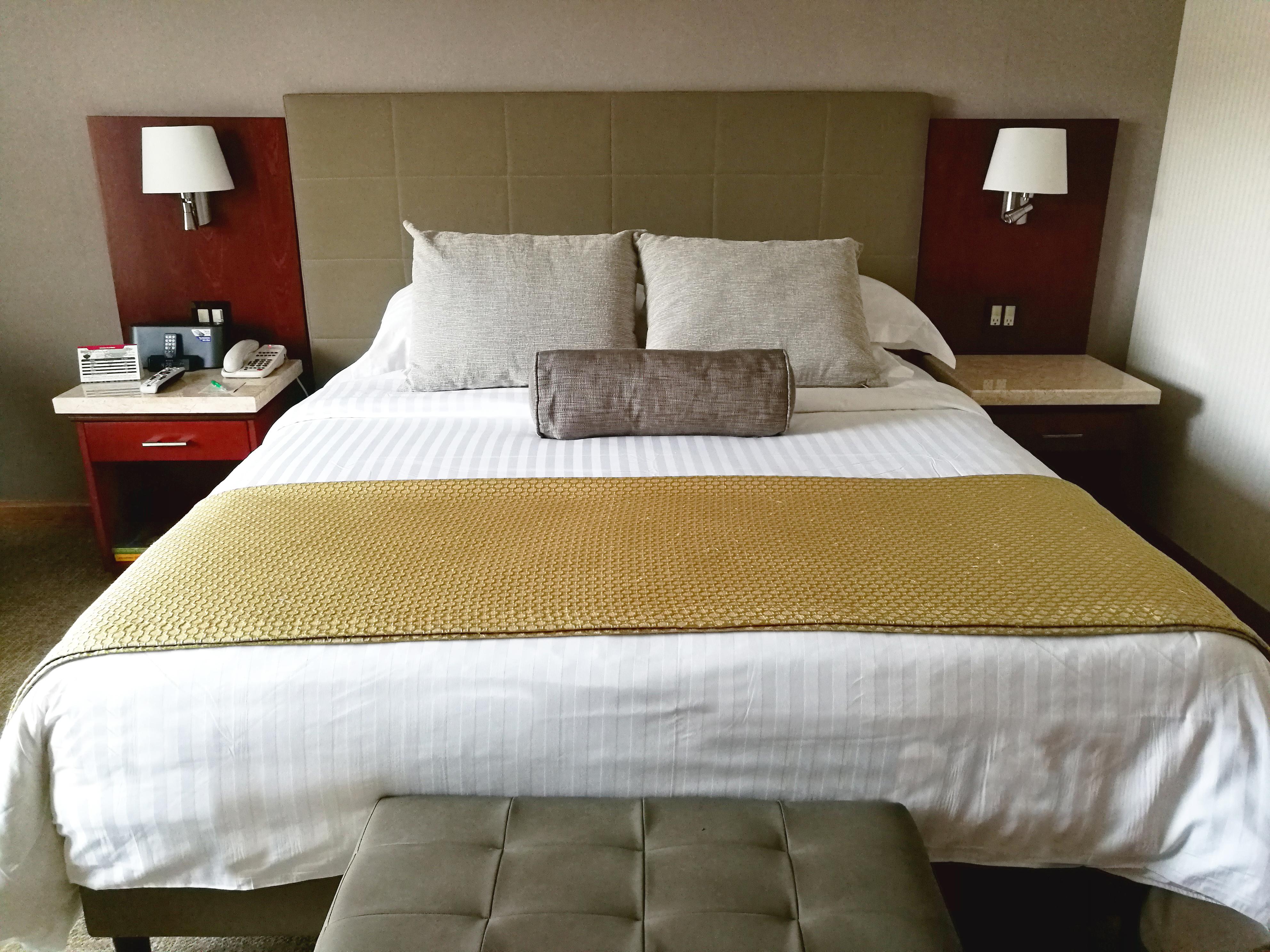 Bogota Plaza Hotel Exterior photo A bed with a bed runner